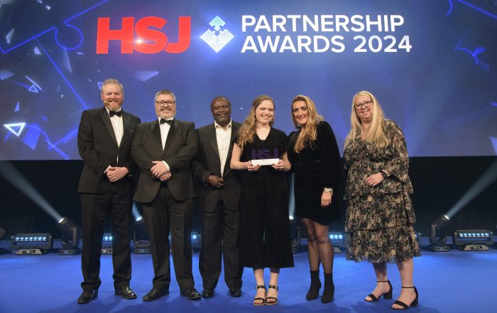 Staff from the Suicide Bereavement Service accepting their HSJ Award