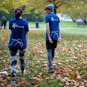 A photograph of two women in a park in London as they embark on a fundraising walk for Mind