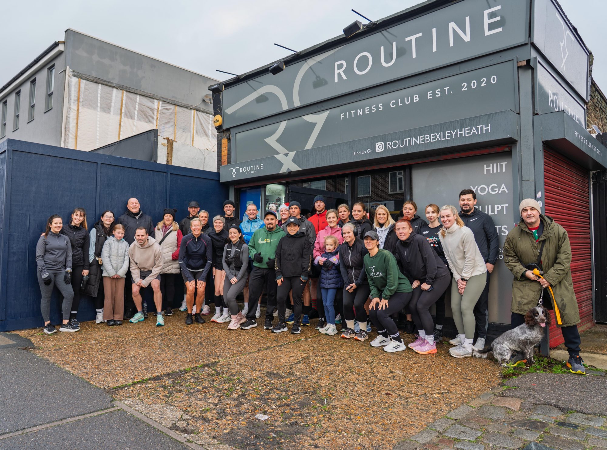 A group of over 30 runners stood outside Routine Fitness in Bexleyheath