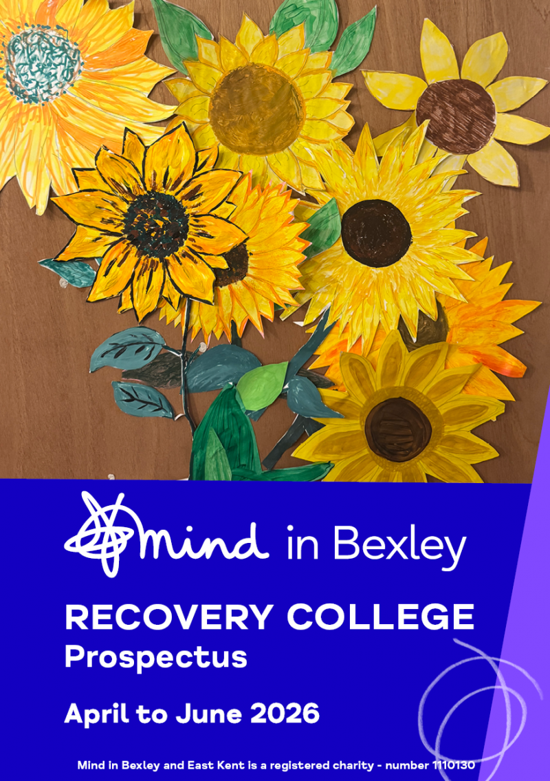 Cover of the Mind in Bexley Recovery College Prospectus for April to June 2026. The top half shows a collage of hand-drawn yellow sunflowers with green leaves on a wooden background. The bottom half is a bold blue panel featuring the Mind in Bexley logo and the text “Recovery College Prospectus” and “April to June 2026”