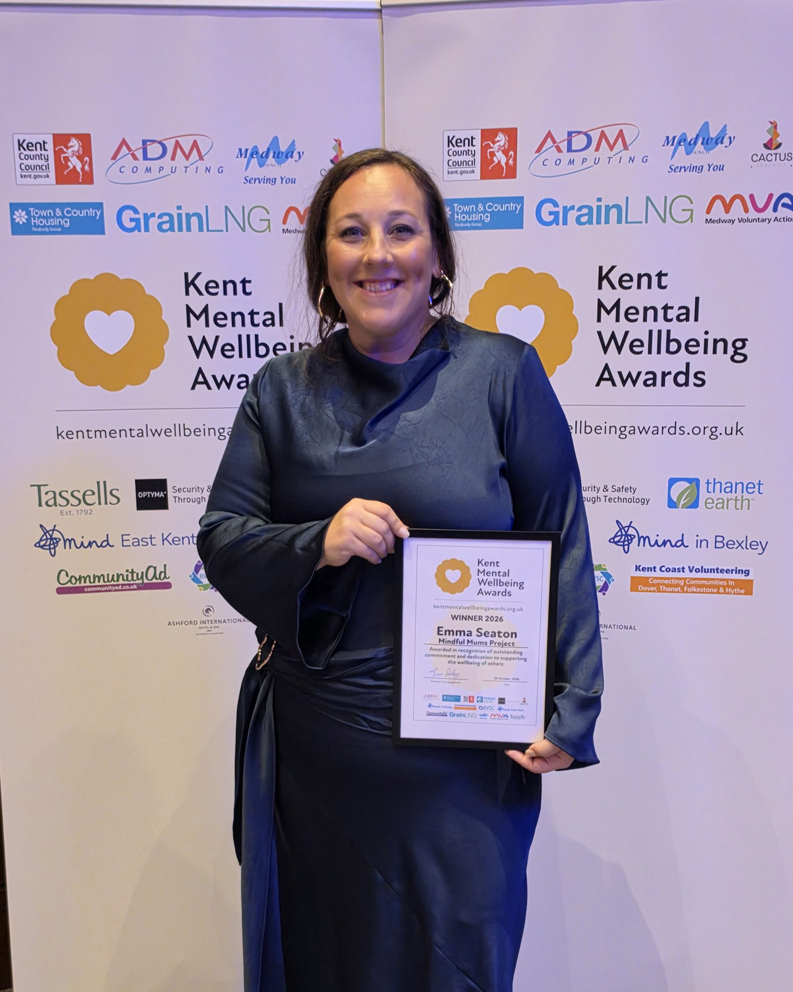 Emma award Emma Seaton from the Mind in Bexley Mindful Mums service with her certificate at the Kent Mental Wellbeing Awards